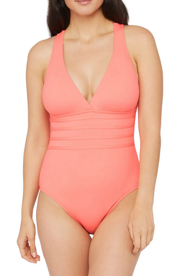 Model wears a one-piece swimsuit sold at Nordstrom Rack.