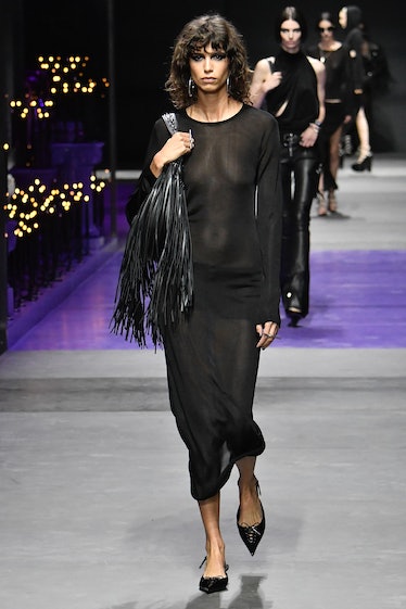 Mika Arganaraz walks the runway at the Versace Ready-to-Wear Spring/Summer 2023 fashion show...