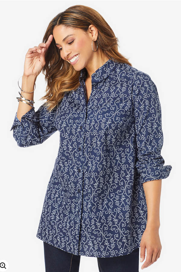 The model is wearing a plus-size patterned button-down tunic.