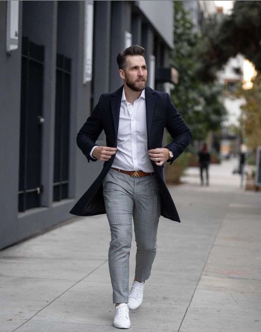 Man wearing smart casual non iron dress shirt and sneakers