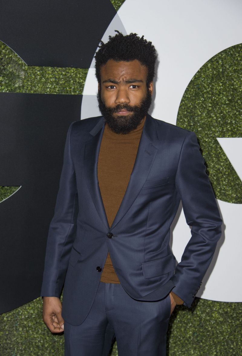 Donald Glover in suit with turtleneck