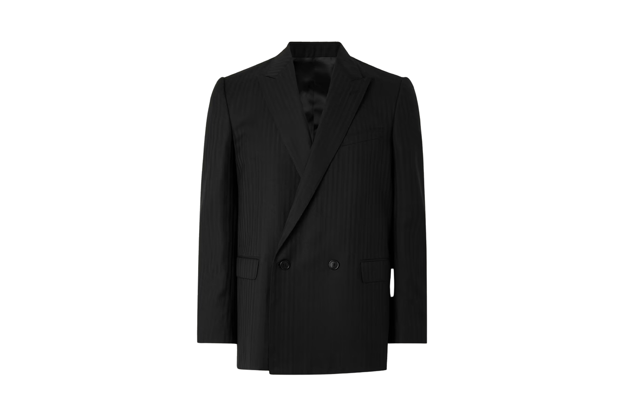 Image may contain: clothing, apparel, suit, overcoat, coat, tuxedo, jacket and blazer